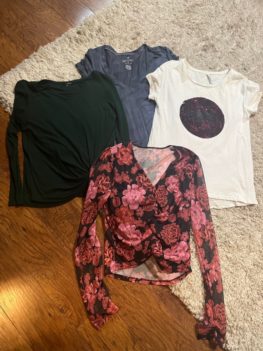 Two long sleeved and two short sleeved tops